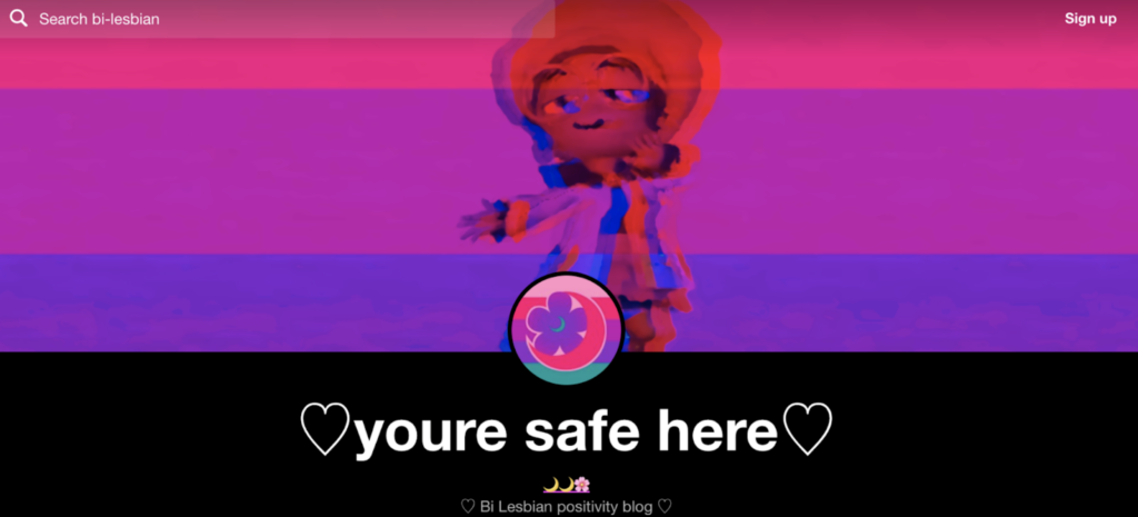 A screenshot from lesbian blogger @rouge-the-bat’s Bi Lesbian positivity blog with a lesbian and bisexual flag graphic overlaid on an avatar and the words “you’re safe here” at the top.
