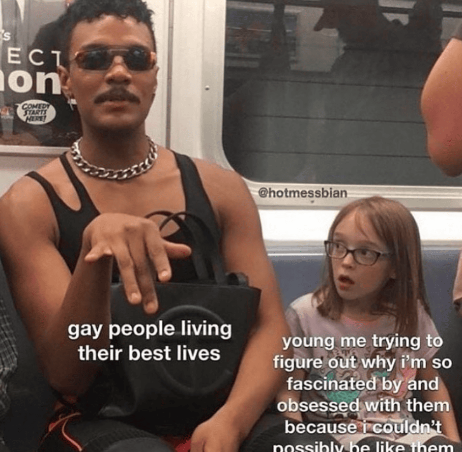 a bisexual meme with a cool fashionable person and a child onlooker. Overlaid the cool person is text that says “gay people living their best lives” and overlaid the child is “young me trying to figure out why i’ so fascinated by and obsessed with them because i couldn’t possibly be like them”