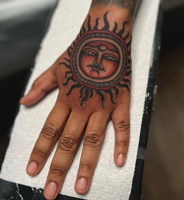 El sol tattoo by queer tattoo artist Jaylind Ezili.