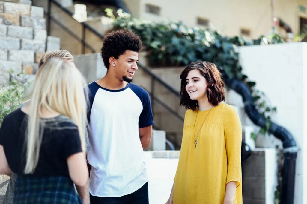Four young friends talk to each other about heteroflexibility.