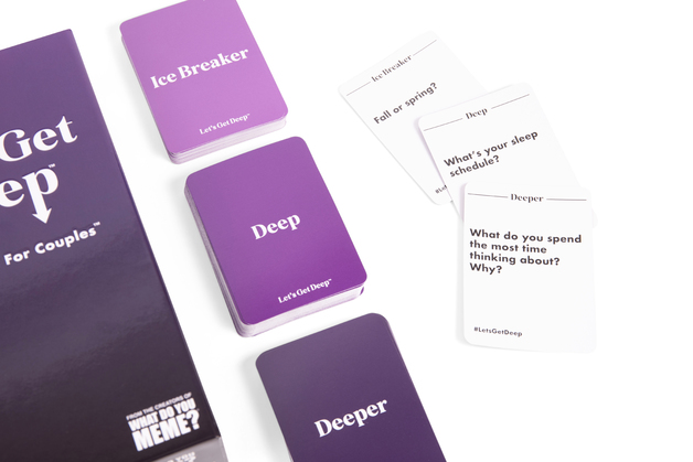 Let’s Get Deep is a card game – seen here with a purple on one side of the cards – that can be played with your partner on a queer date night. The other side is white with the prompts in black lettering. 