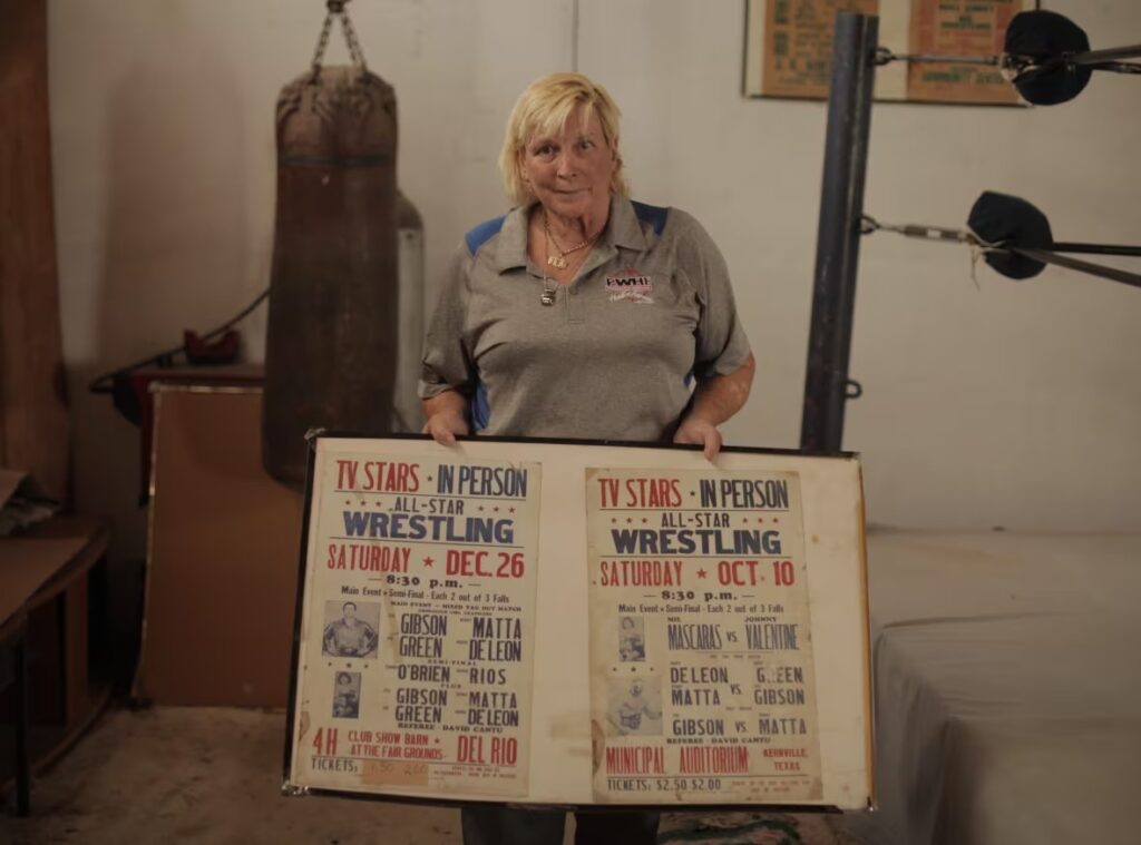 Retired pro wrestler and pro wrestling trainer Susan "Tex" Green in a still from Out in the Ring by Ry Levey—a documentary that examines the history of LGBTQIA+ professional wrestlers past and present.