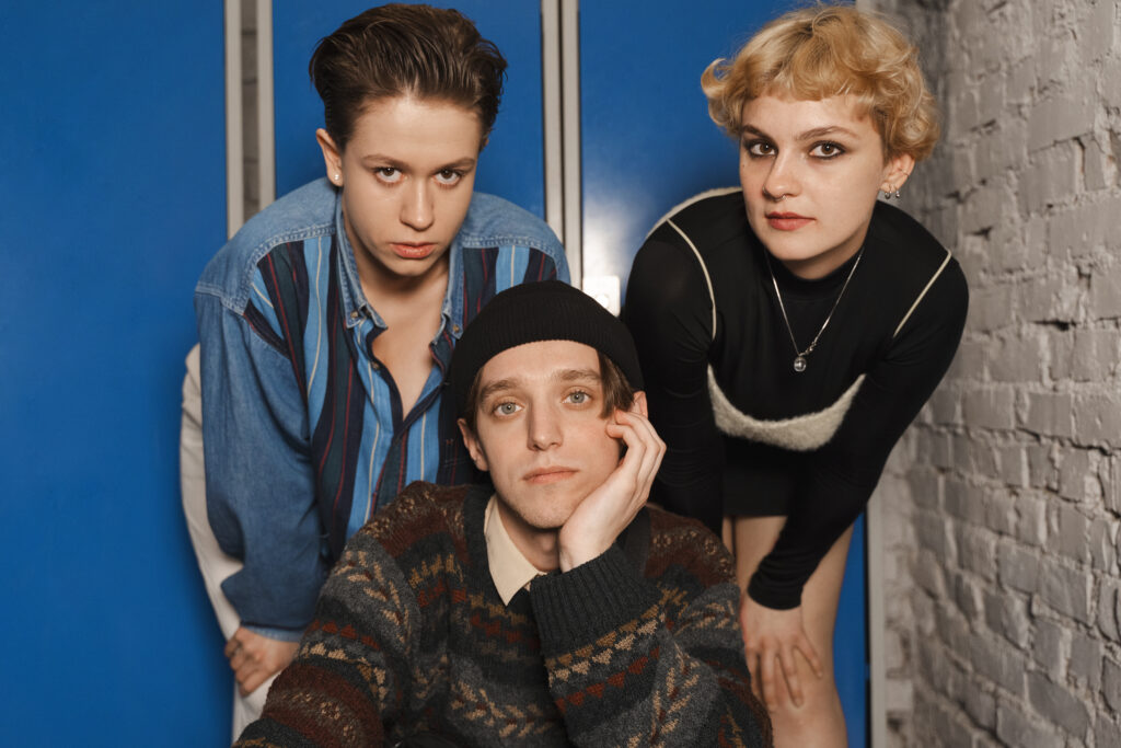 Group of three people with alternative style.