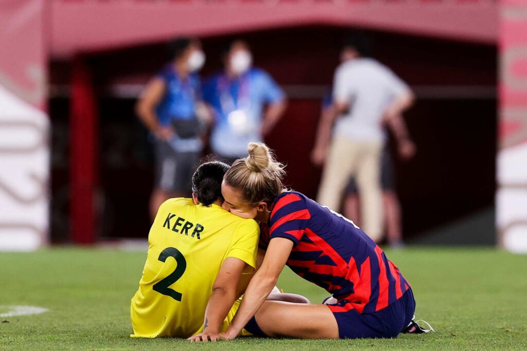 Kristie Mewis, a lesbian USWNT player, confronts her girlfriend Sam Kerr after Team USA defeated Australia in the bronze medal match at the Tokyo Olympics.