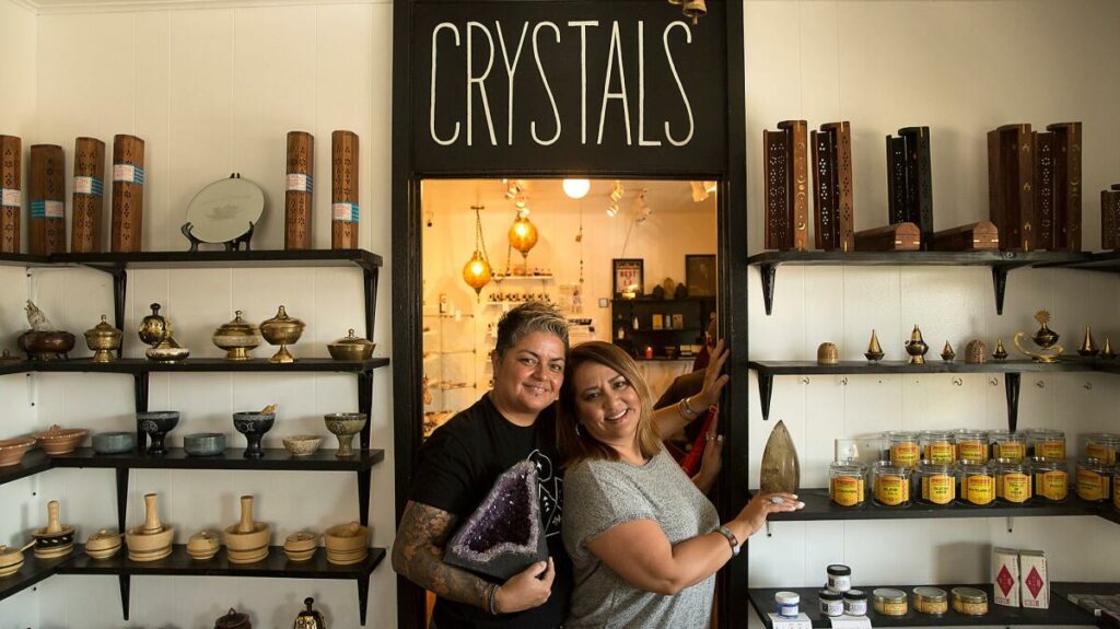 Alex Naranjo and Marlene Vargas posing inside their first store.