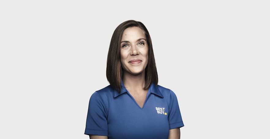 Headshot of Corie Barry wearing the Best Buy polo shirt.