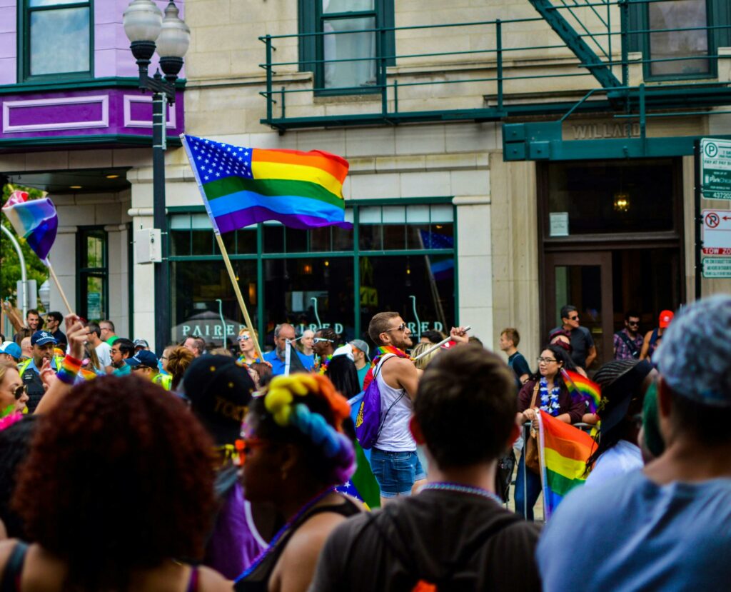 A group of diverse LGBT individuals at a Pride event