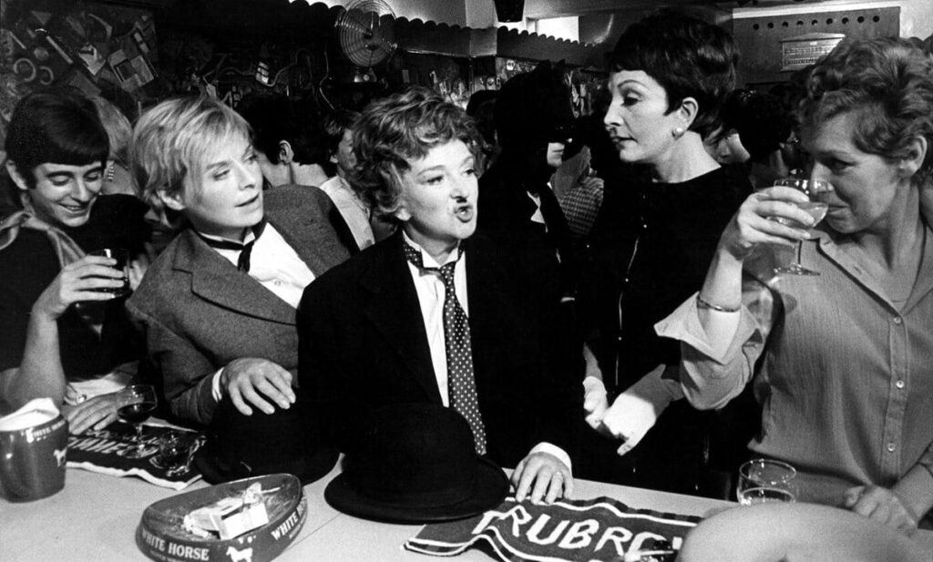 Film still from The Killing of Sister George (1968) depicting scenes filmed inside the Gateways Club. Some extras were portrayed by Gateways regulars.