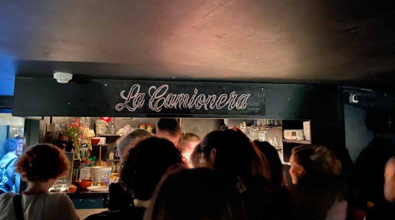 Basement bar at La Camionera: vibrant scene from the lesbian night pop-up event