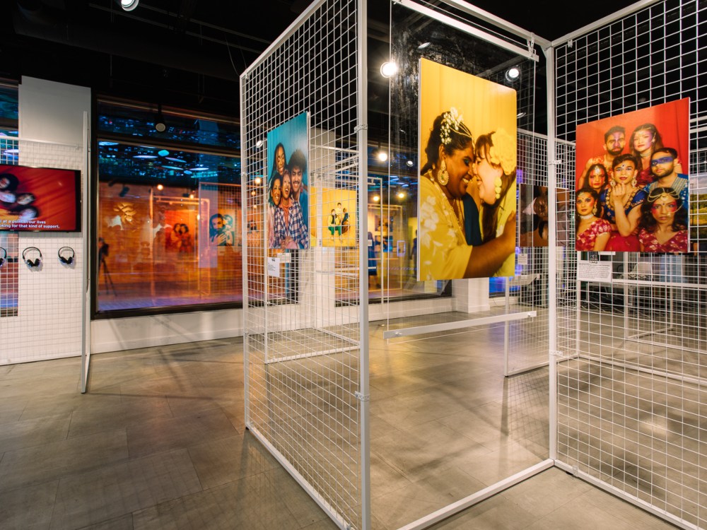 Image of colorful exhibits within Queer Britain Museum in London, showcasing diverse representations of LGBTQ+ individuals.