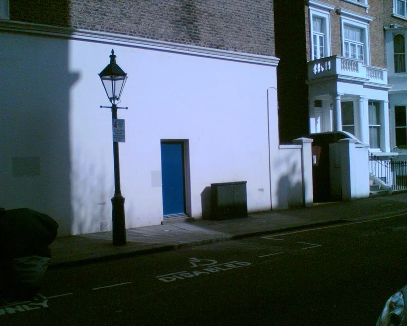 Exterior of The Gateways Club, a social club established as a safe haven for lesbians, now painted blue.