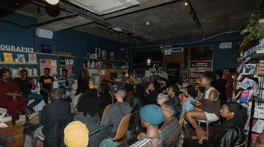 Individuals of diverse backgrounds gather at the Common Press to celebrate and promote LGBT equality.