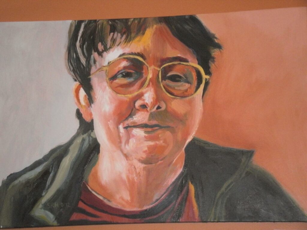 Portrait of Barbara Kahn, a lesbian playwright, surrounded by vibrant colors that reflect her creative spirit.