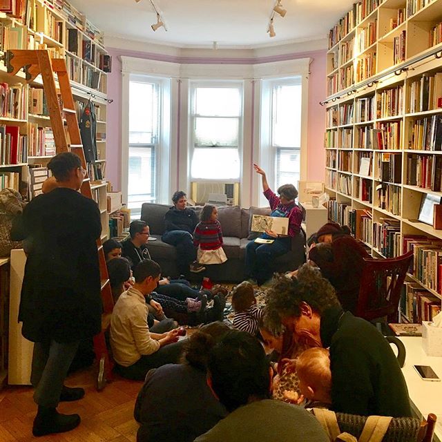 People learning about lesbian history at Lesbian Herstory Archives