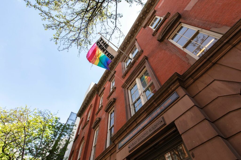 Exterior of an LGBT Community Center, featuring a colorful facade with the center's name displayed.