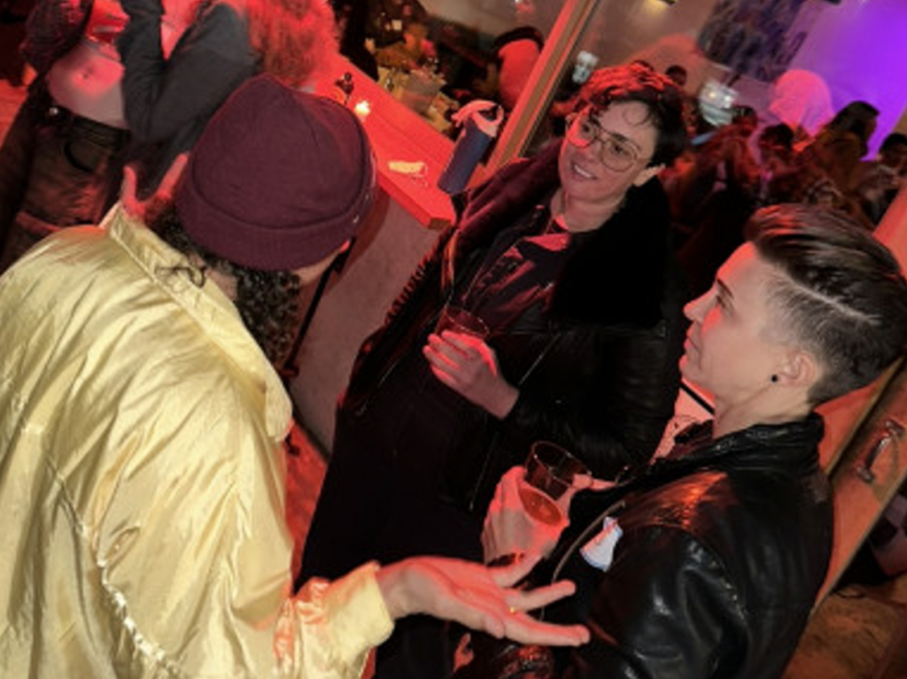 a group of lesbians, trans and sapphics hanging out