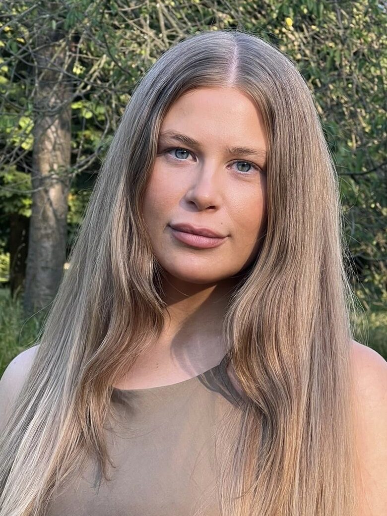 Ella Leah sharing advice for LGBTQ+ professionals and sharing opinions about Pride Month with HER app, the largest sapphic and lesbian dating app