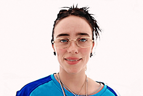 Billie Eilish from the 'LUNCH' music video smiling