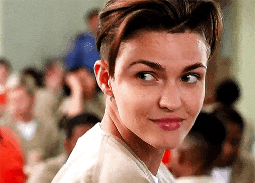 Ruby Rose as Stella Carlin in Orange Is the New Black, smiling and playfully flirting