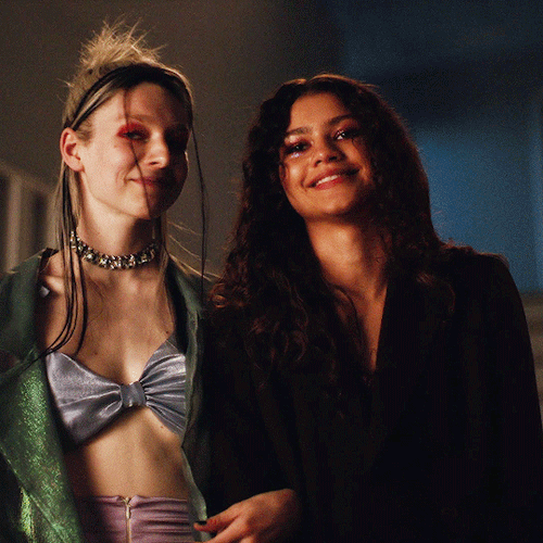 Zendaya as Rue and Hunter Schafer as Jules from Euphoria, holding each other's arms