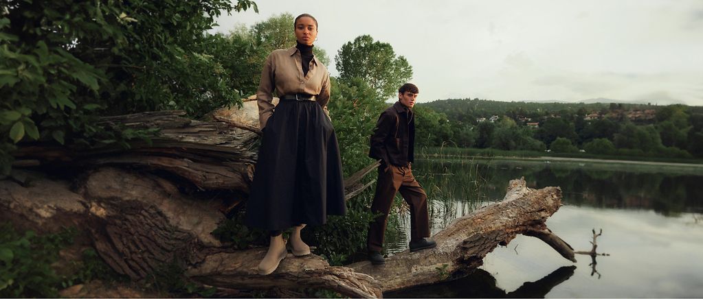 Birkenstock shoes on display in an editorial-style lakeside photoshoot.
